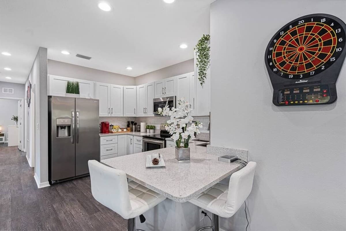 Cozy Kitchen. All our appliances are stainless steel and white cabinets. If you are interested in this property, send us an inquiry!