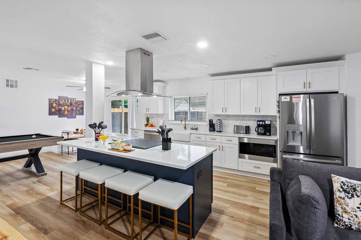 Enjoy the convenience of modern appliances and thoughtful extras, including wine glasses and barware.
