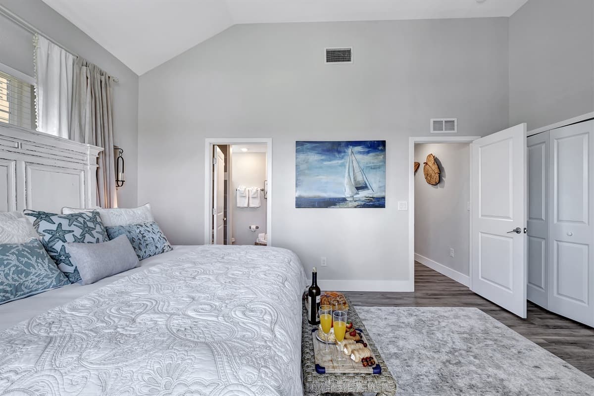 The centerpiece of this opulent haven is the King-size bed, an expanse of comfort that beckons you to sink into its embrace.