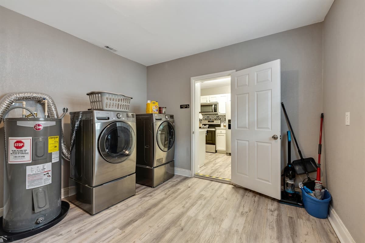 Our laundry area is not just a space for chores; it's a choreographed symphony of functionality and flair.