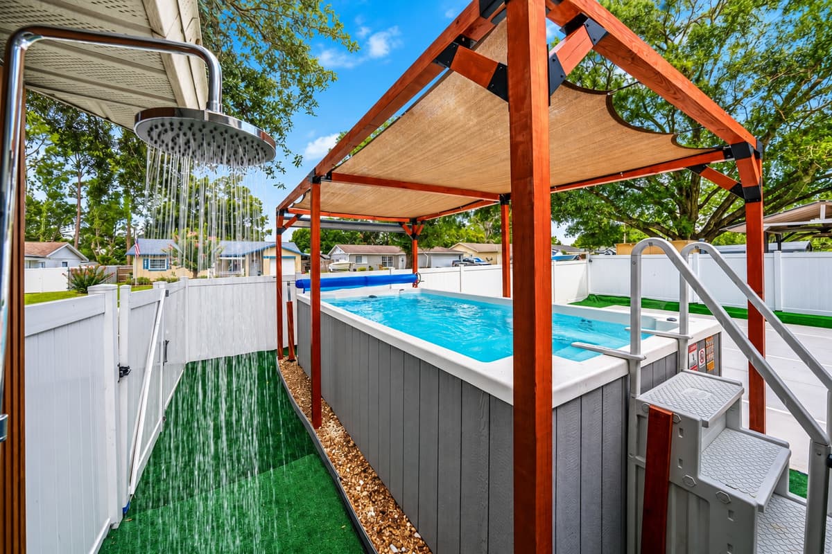 Rinse off in the convenient outdoor shower before stepping into the private swim spa for the ultimate backyard retreat.