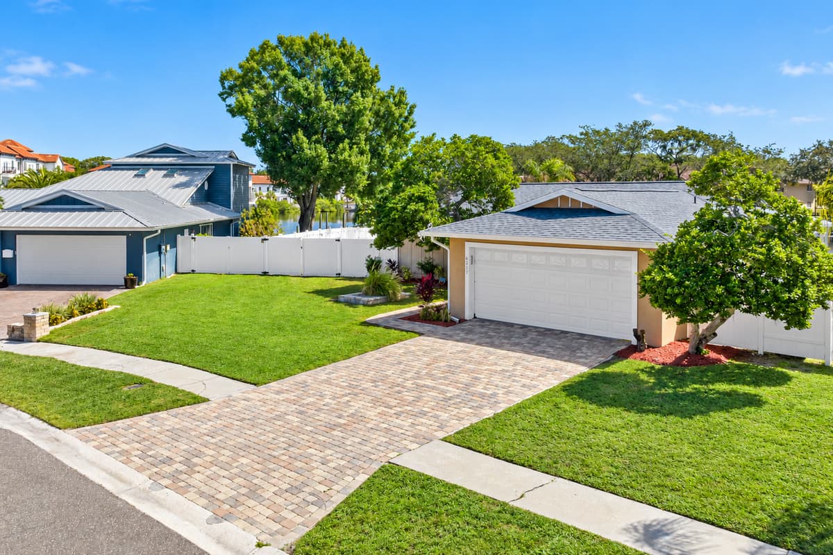 The lovely side view of the house showcasing our magnificent front yard and driveway. If you are interested in this property, don't hesitate to send us an inquiry as soon as possible!