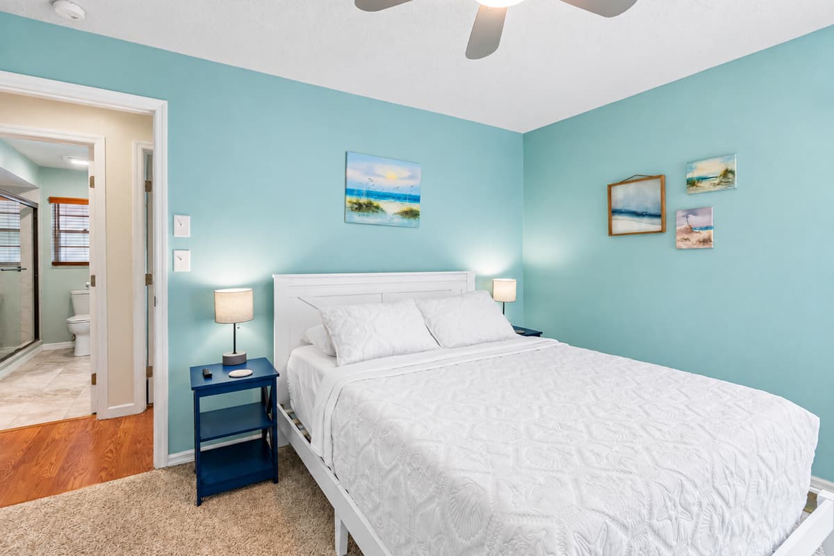 The room is thoughtfully decorated with minimalist accents that enhance the relaxed atmosphere without overwhelming the senses, allowing the beautiful colors and textures to shine.