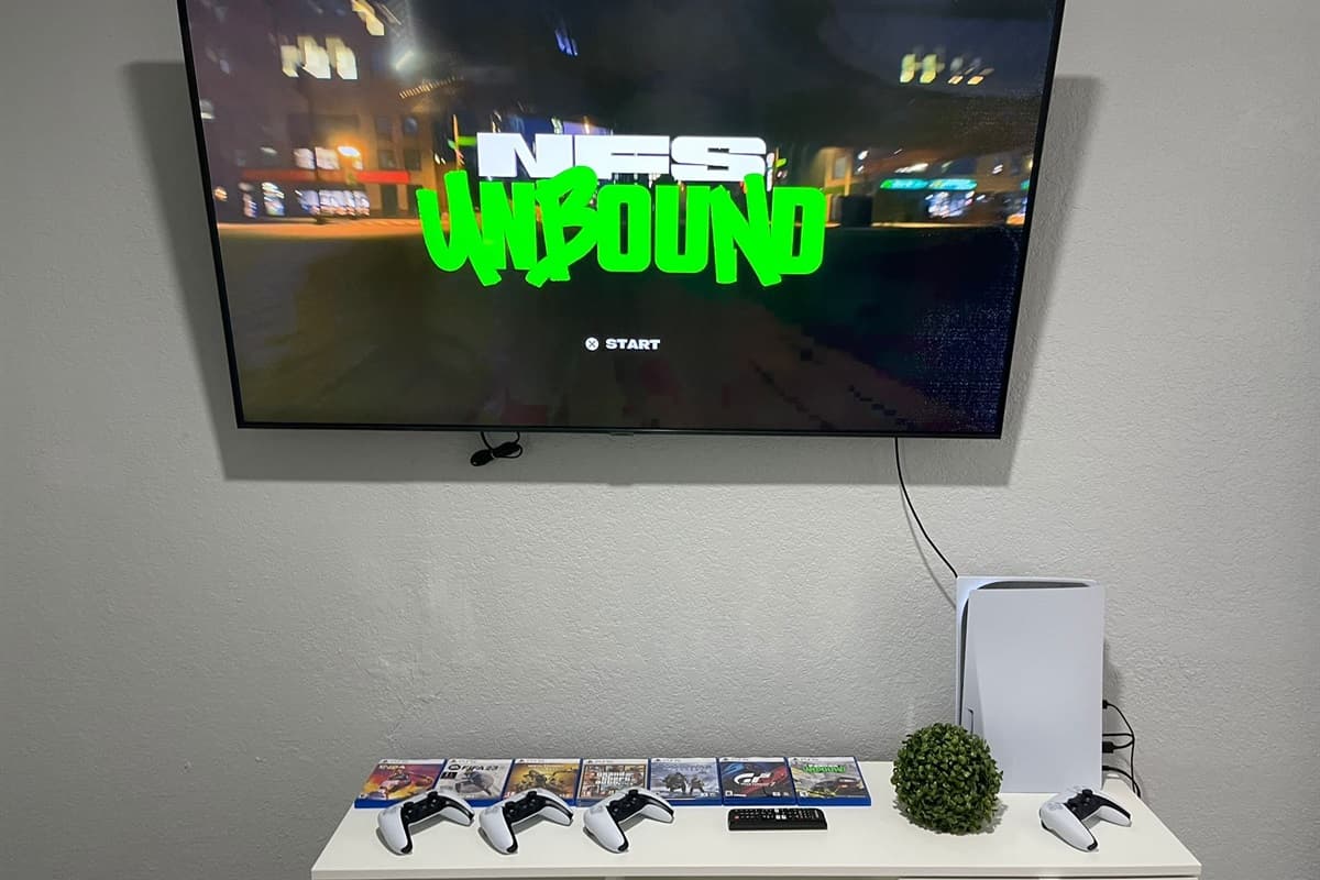 At the heart of the room stands a massive TV, a centerpiece that takes gaming to new heights. 