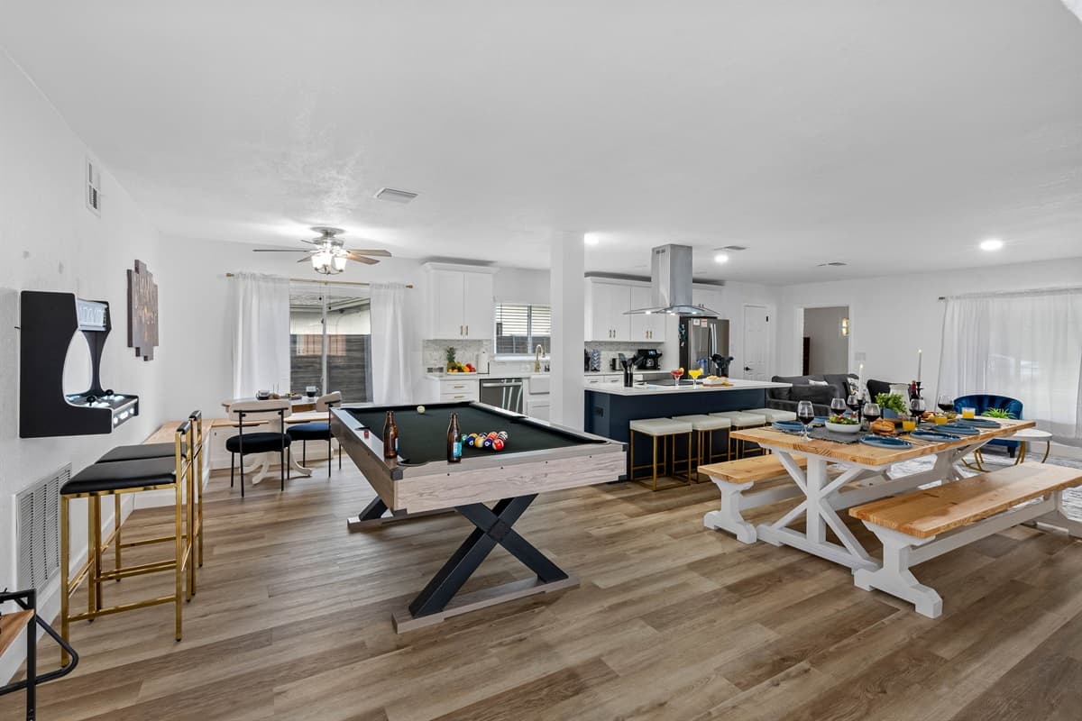 Welcome to your private game zone—complete with a full-size pool table, classic arcade machine, and foosball for hours of family fun!