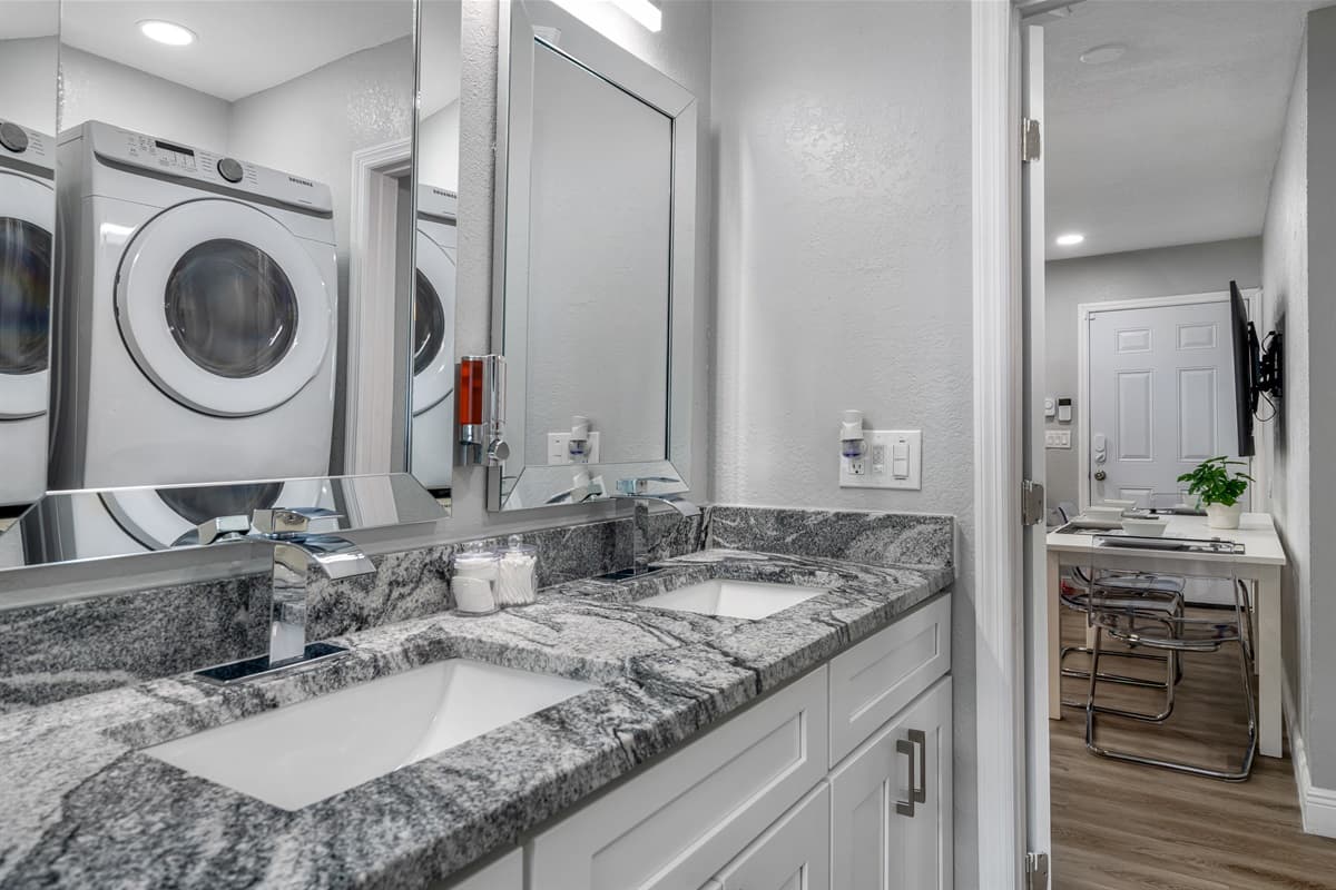 Our beautiful bathroom is equipped with his and hers sink, toilet, bathtub, and shower. Enjoy a relaxing bath after a long day of travel from your home to your home away from home. If you thin