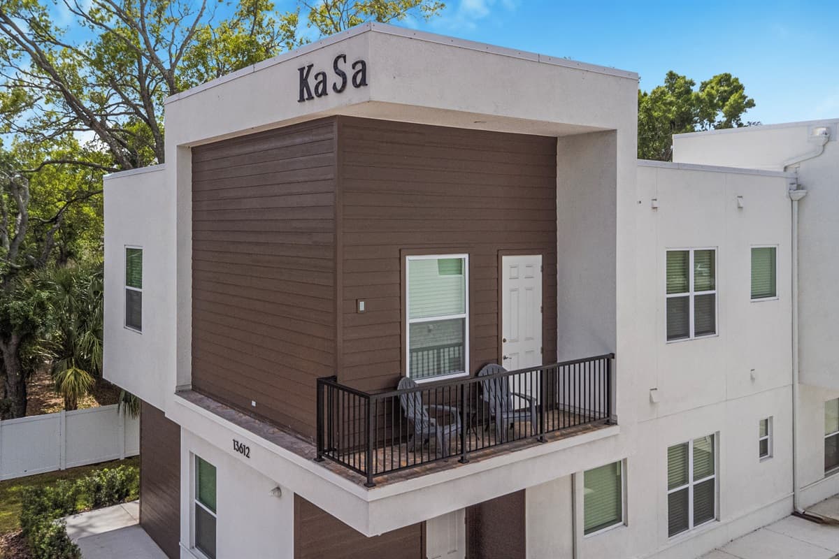 Imagine sipping your morning coffee on this private covered balcony. Your own outdoor oasis in the sky, complete with seating for two.