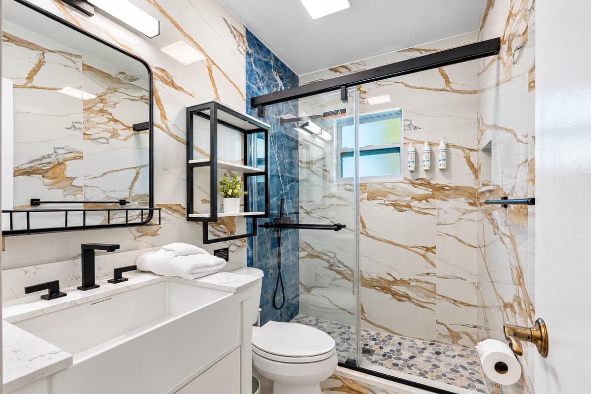 Though compact in size, the bathroom offers everything you need with smart design and efficient use of space.
