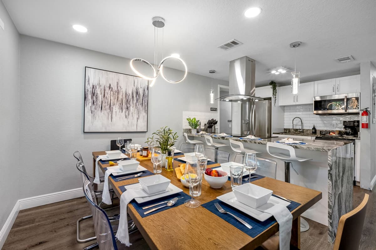 More than 8 people are coming over? We have stools on the kitchen island where others can still sit and enjoy their meals without feeling away from everyone! Don't hesitate to send us a message as soon as possible!