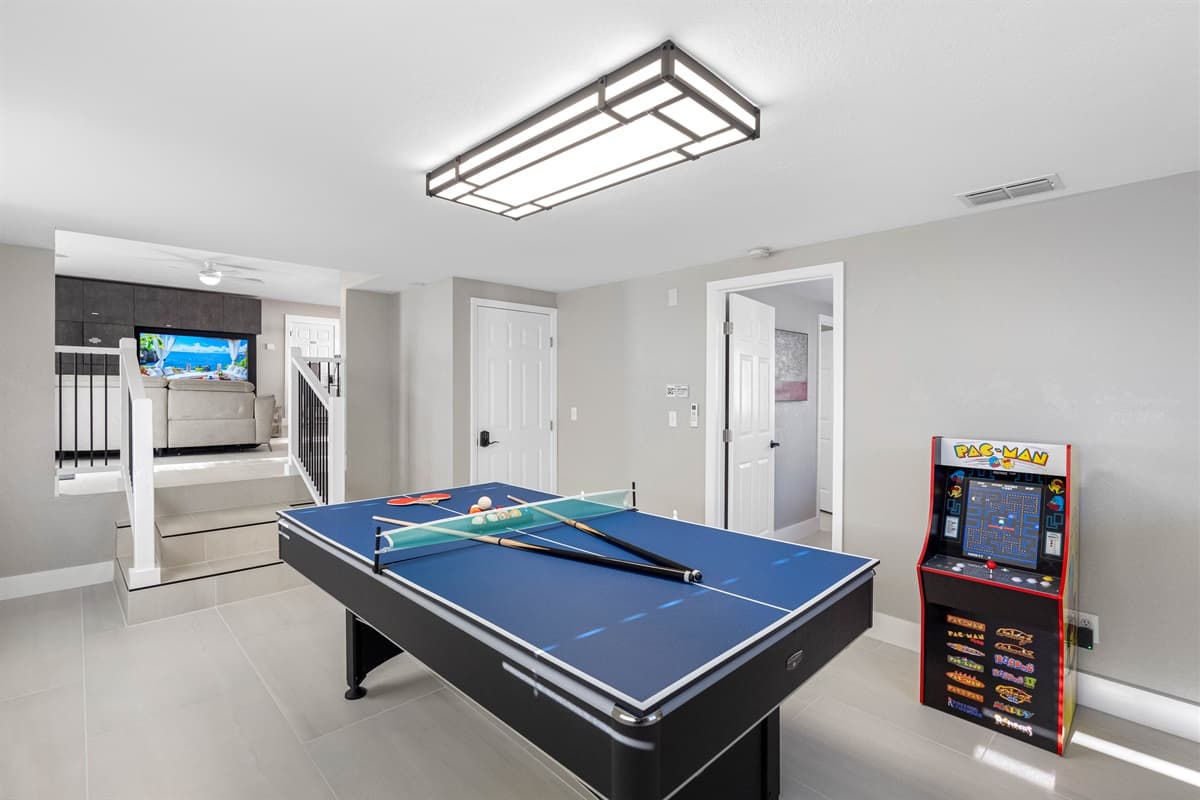 Equipped with a high-quality pool table that effortlessly converts into a thrilling pingpong table.