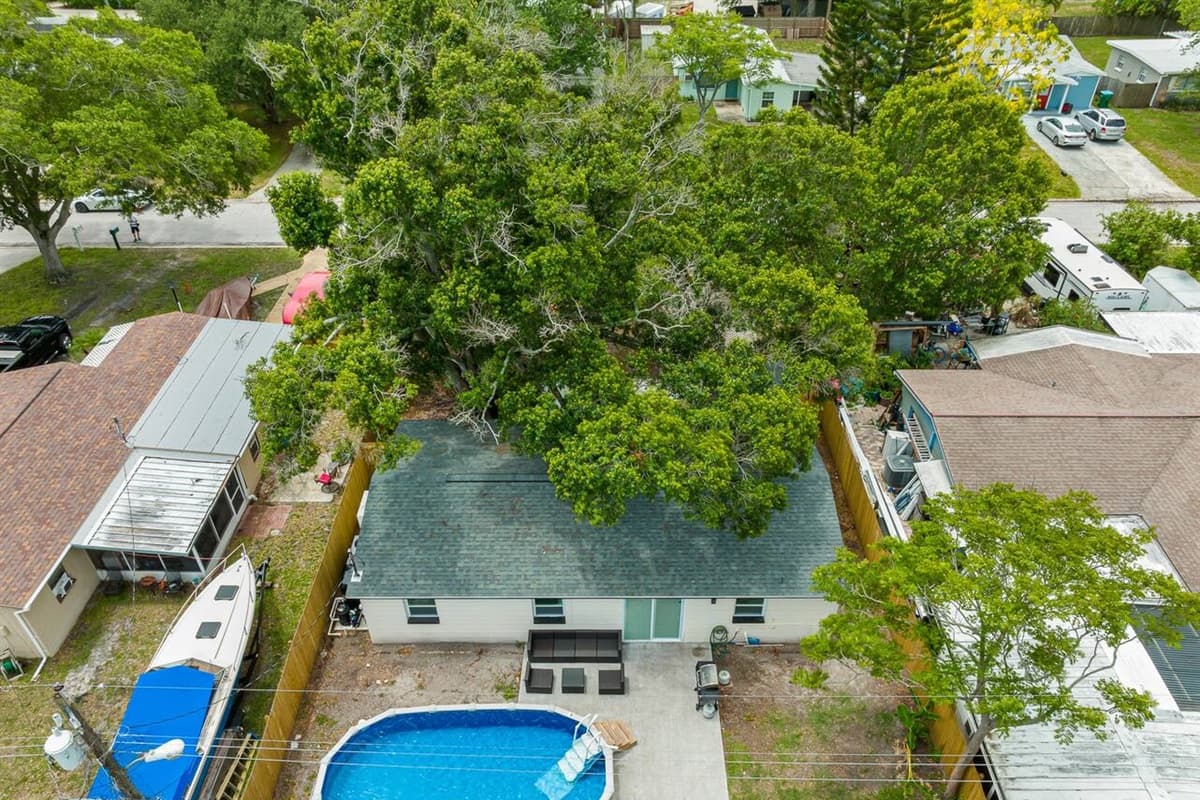 Aerial top view of our incredible house showcasing the beautiful swimming pool!