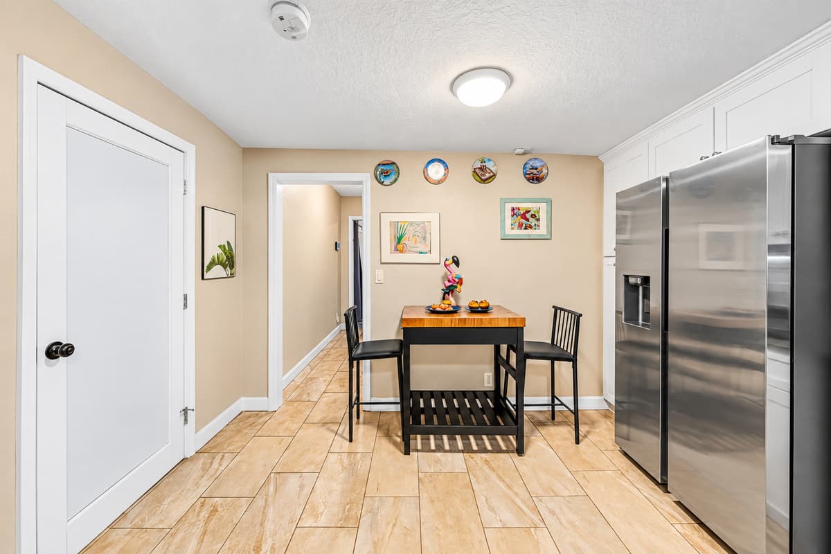 Cozy breakfast nook with seating for casual meals, coffee, or quick bites.