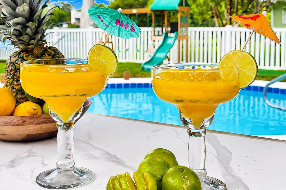 Blend, pour, and step outside — cocktails hit different with the pool a few feet away and the kids busy on the playground