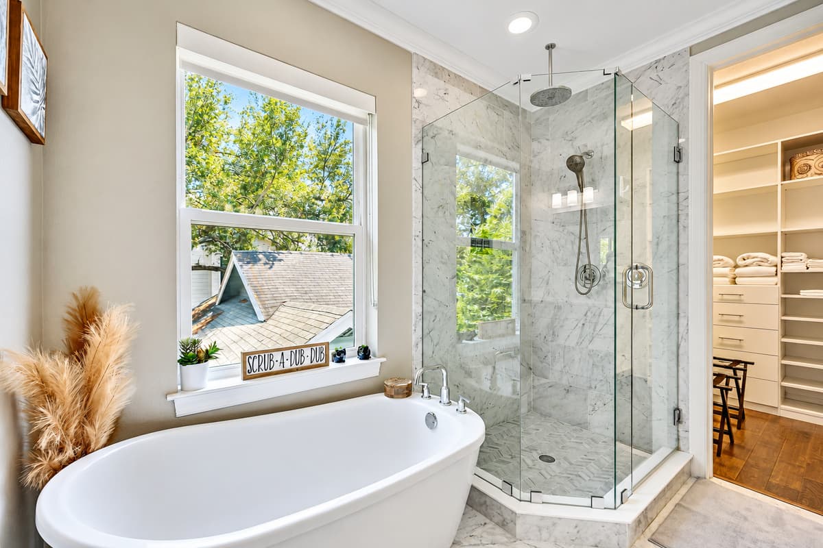 The sleek design of the tub adds a touch of elegance to the space, while the high-quality fixtures ensure a comfortable and enjoyable bathing experience.