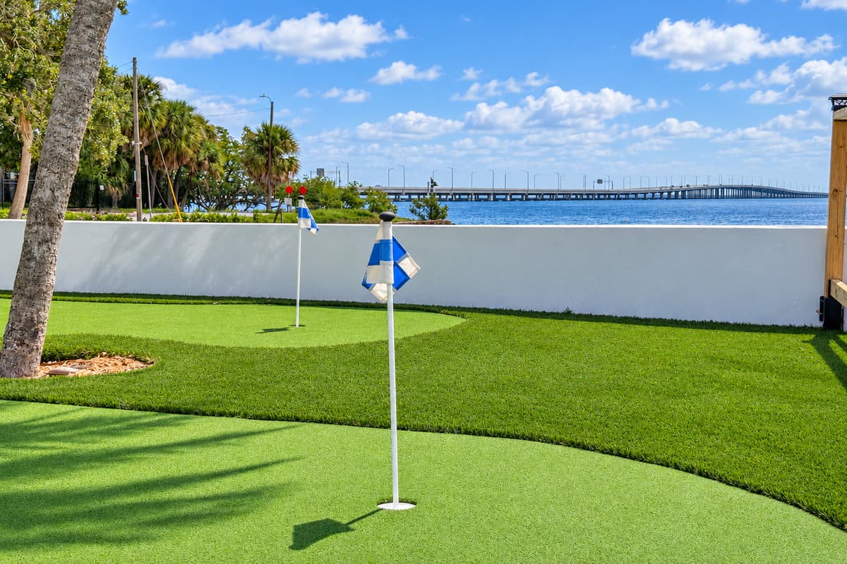 Private putting green beside the waterfront.