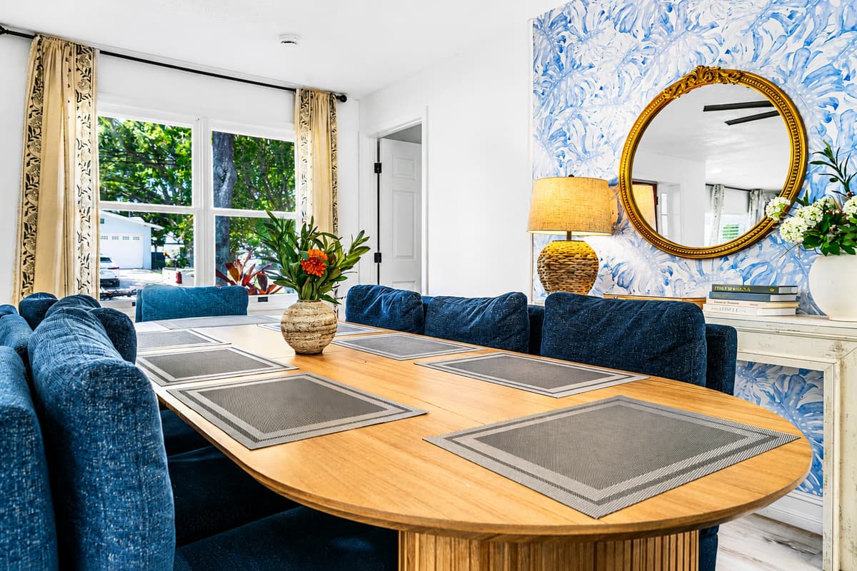 The table you'll play cards on after the plates are cleared. Comfortable enough that nobody gets up.