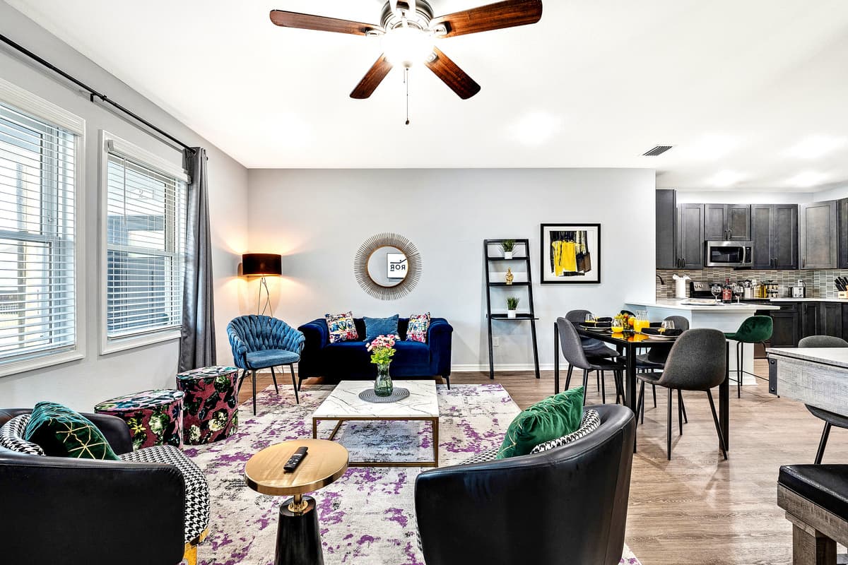 The inviting ambiance is further enhanced by the carefully selected color palette and tasteful decor, creating a space that exudes both warmth and sophistication.