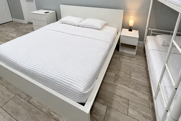 This thoughtfully arranged room includes a king-size bed plus a bunk bed, making it a great setup for parents traveling with children. *Updated photos will be added soon!
