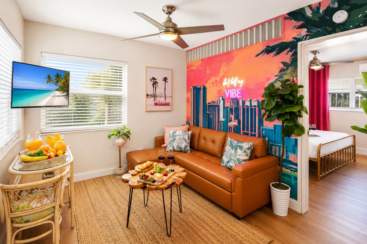 The welcoming layout connects the living room and bedroom, creating a bright, airy space designed for comfort and convenience.