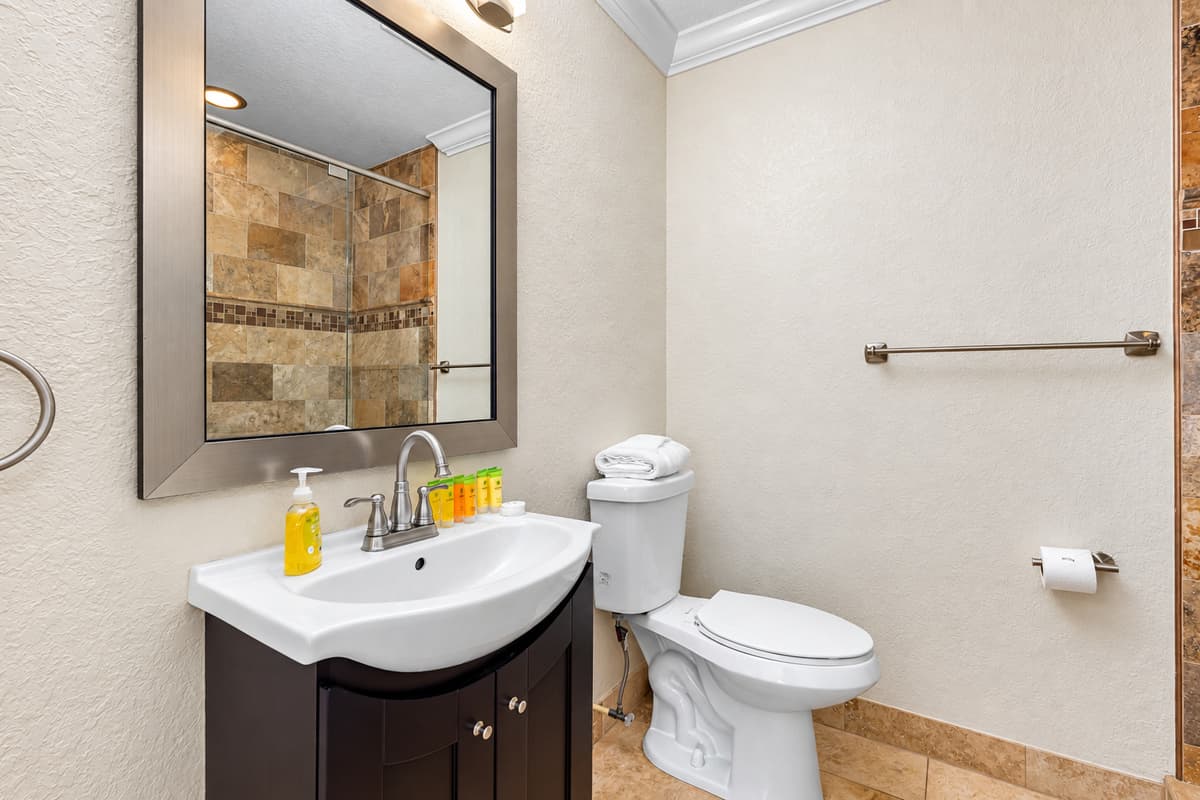 This full bathroom is conveniently located and ideal for shared use.