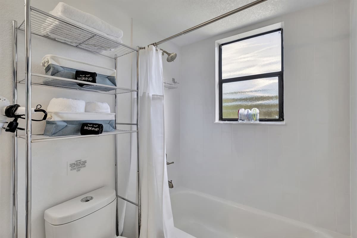 The bathroom is also equipped with premium bath products, adding a touch of indulgence to your stay.