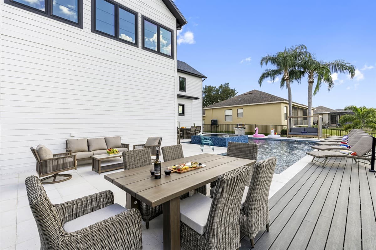 For those who enjoy dining outdoors, the pool area features a dining table set for six, making it perfect for al fresco meals.