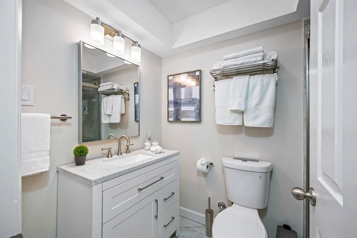 Beautiful bathroom equipped with sink, toilet, and shower. Enjoy a relaxing bath after a long day of travel from your home to your home away from home. If you think this property is for you, send us an inquiry right away!