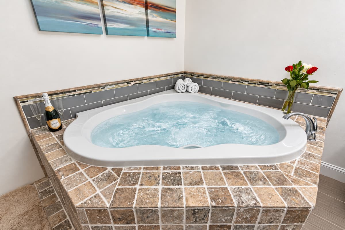 From the luxurious soaking tub to the sumptuous finishes, every detail is designed to elevate your self-care routine.