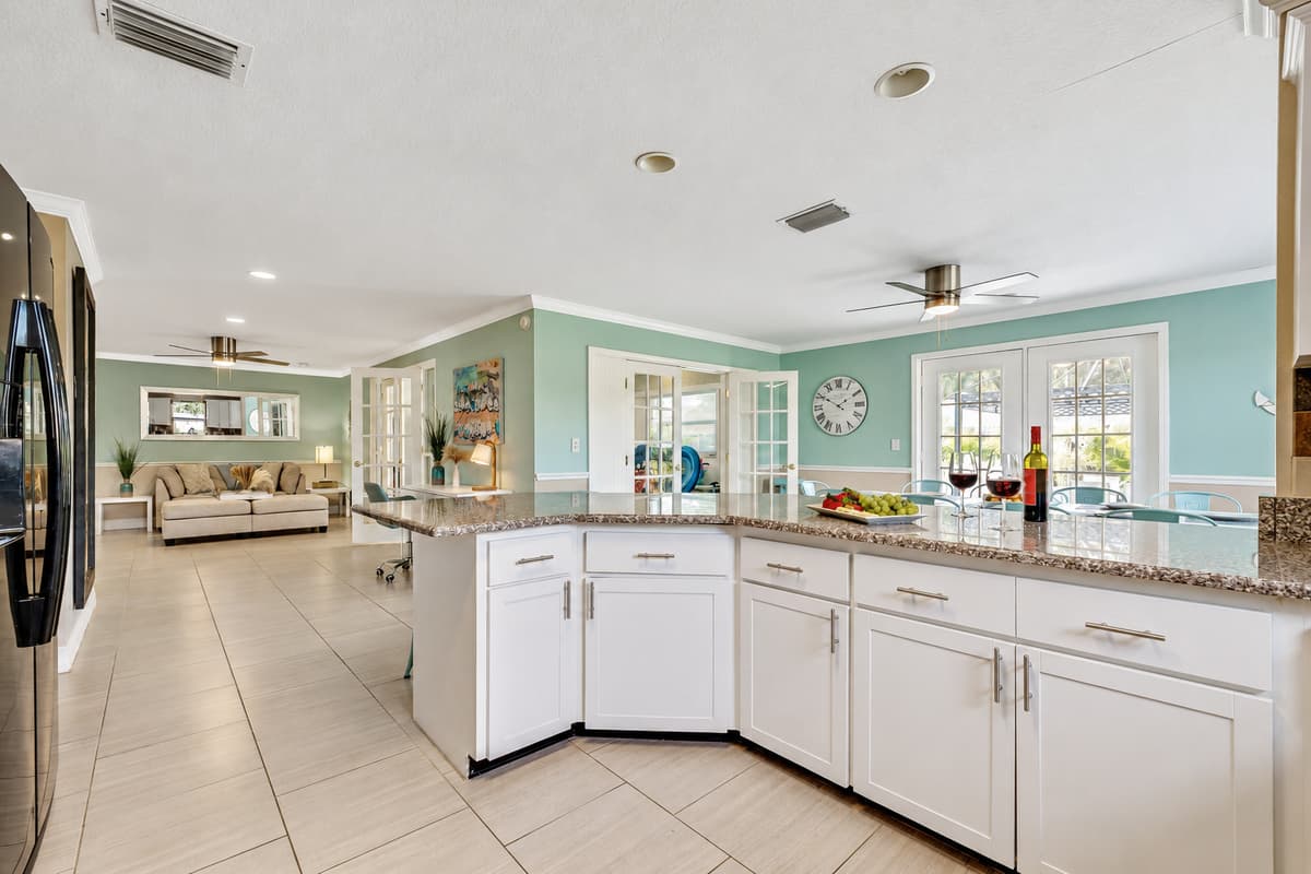 Step into the heart of our home, the kitchen, where culinary dreams come to life and family moments are savored.