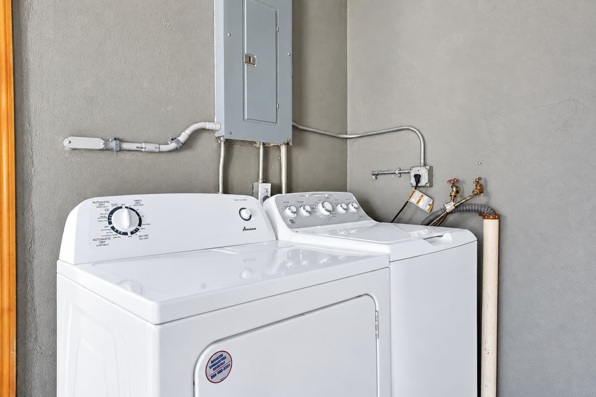 Free laundry on site, no coins and no schedule. Run a load mid-week and you can pack half the suitcase you thought you needed — especially useful for anyone flying in with a carry-on only.