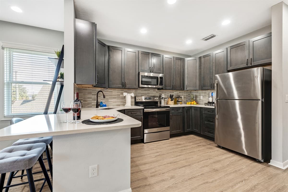 Ample cabinet space and cleverly designed storage areas provide not only functionality but also an opportunity for organization.