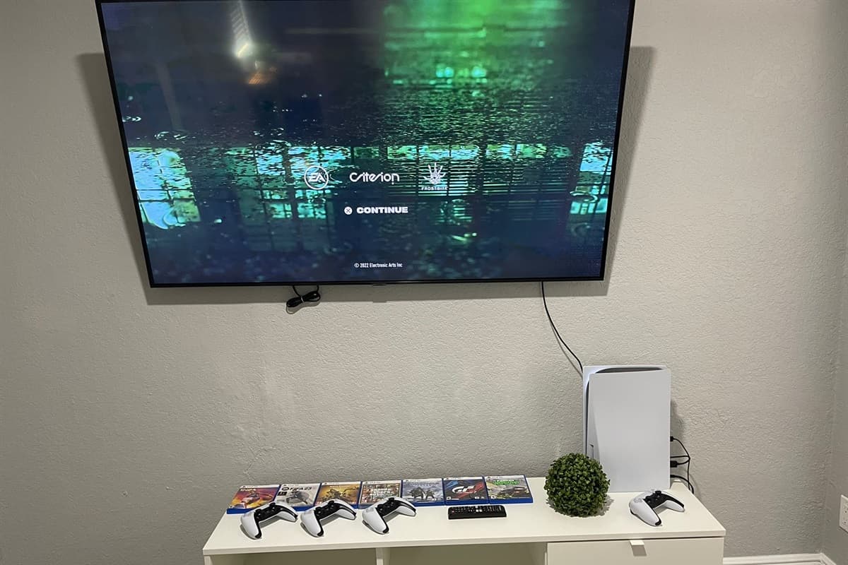 The game room is equipped with the latest PlayStation console, offering access to a vast library of cutting-edge games and immersive virtual experiences.