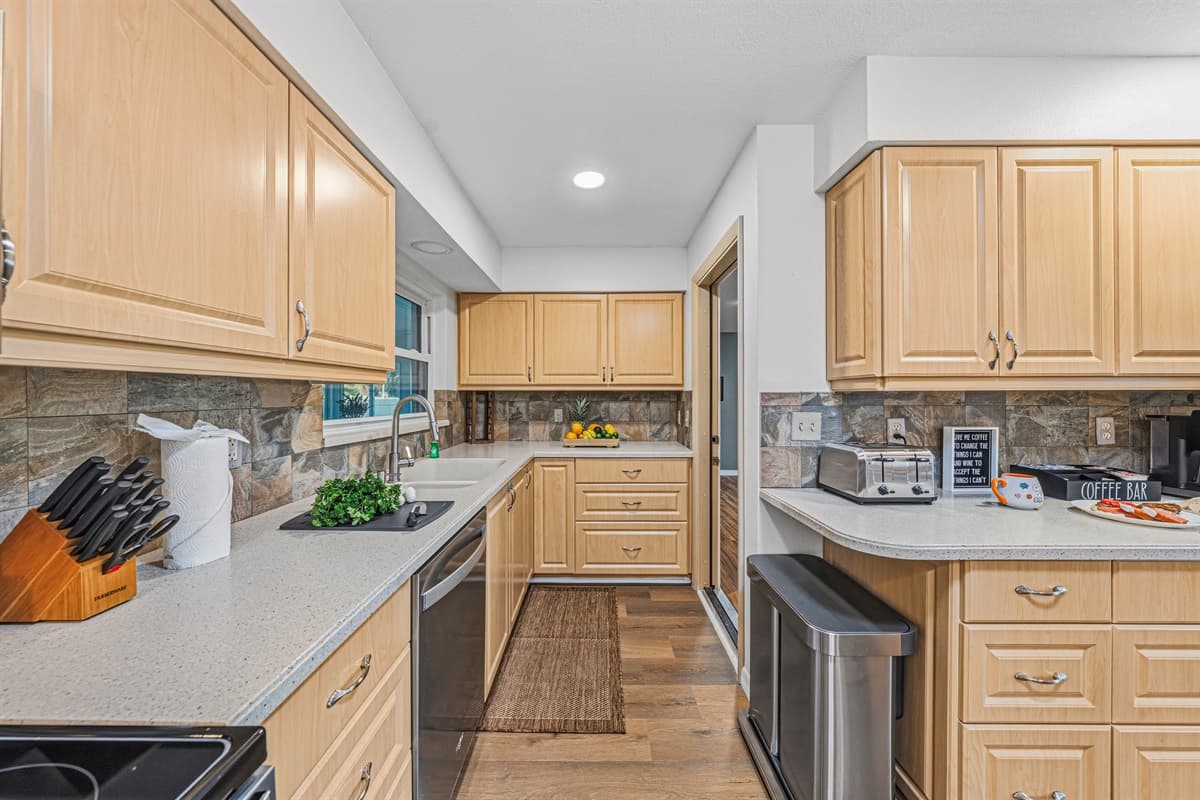 Fully equipped kitchen with generous cabinetry and everything needed for a comfortable stay 