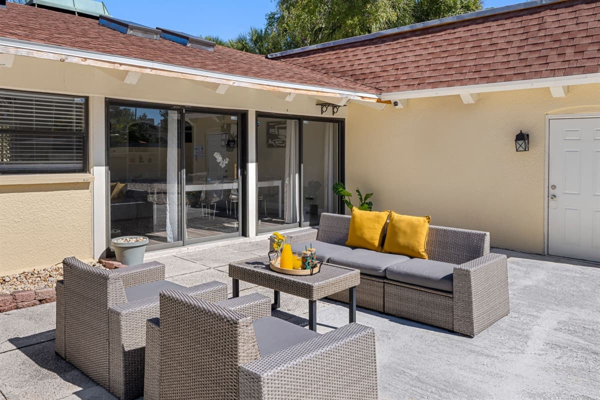 Sleek furniture, a sparkling pool, and open skies — this modern patio invites you to relax in style from sunrise to sunset.