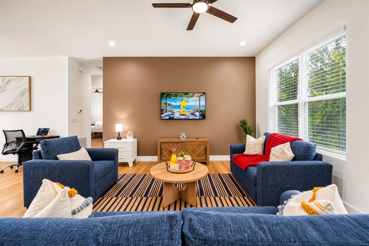Sink into the plush sectional, fire up the Smart TV, and grab the popcorn. This living room was designed for unforgettable movie nights.