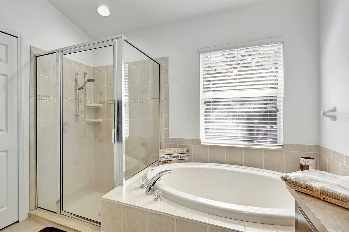 Whether you're starting your day with an invigorating shower or unwinding in a soothing bath, this ensuite is your personal retreat.