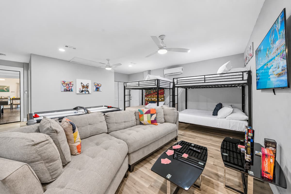 Spacious entertainment room designed for movie nights, games, and group fun.