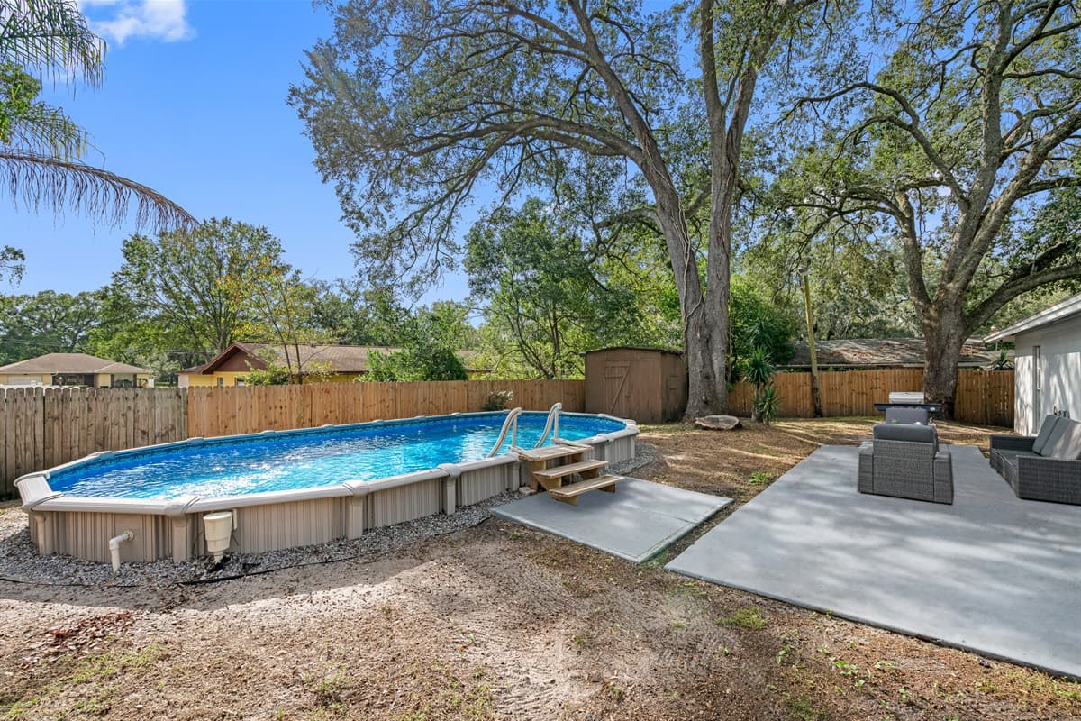 Impeccable fully fenced backyard with a beautiful heated pool, beautiful trees and a grill you could use while creating wonderful memories with your family and friends. If you love what you see, send us an inquiry now!