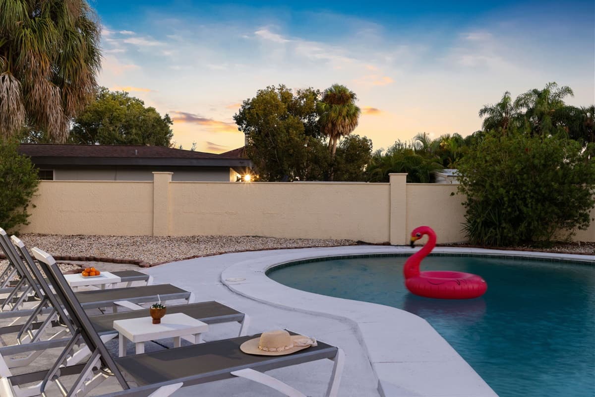 Find your calm by the water. This beautifully maintained backyard offers privacy, comfort, and all the space you need to unwind.