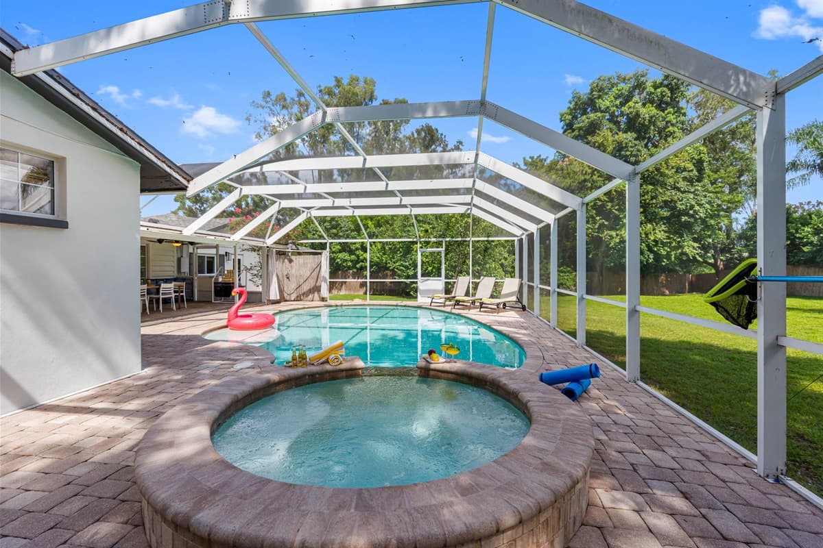 Tropical outdoor escape with heated pool and soothing spa.
IMPORTANT NOTE: The spa isn’t a traditional hot tub. It has jets, but it’s designed more for relaxing than for a full hot tub or sauna experience.
