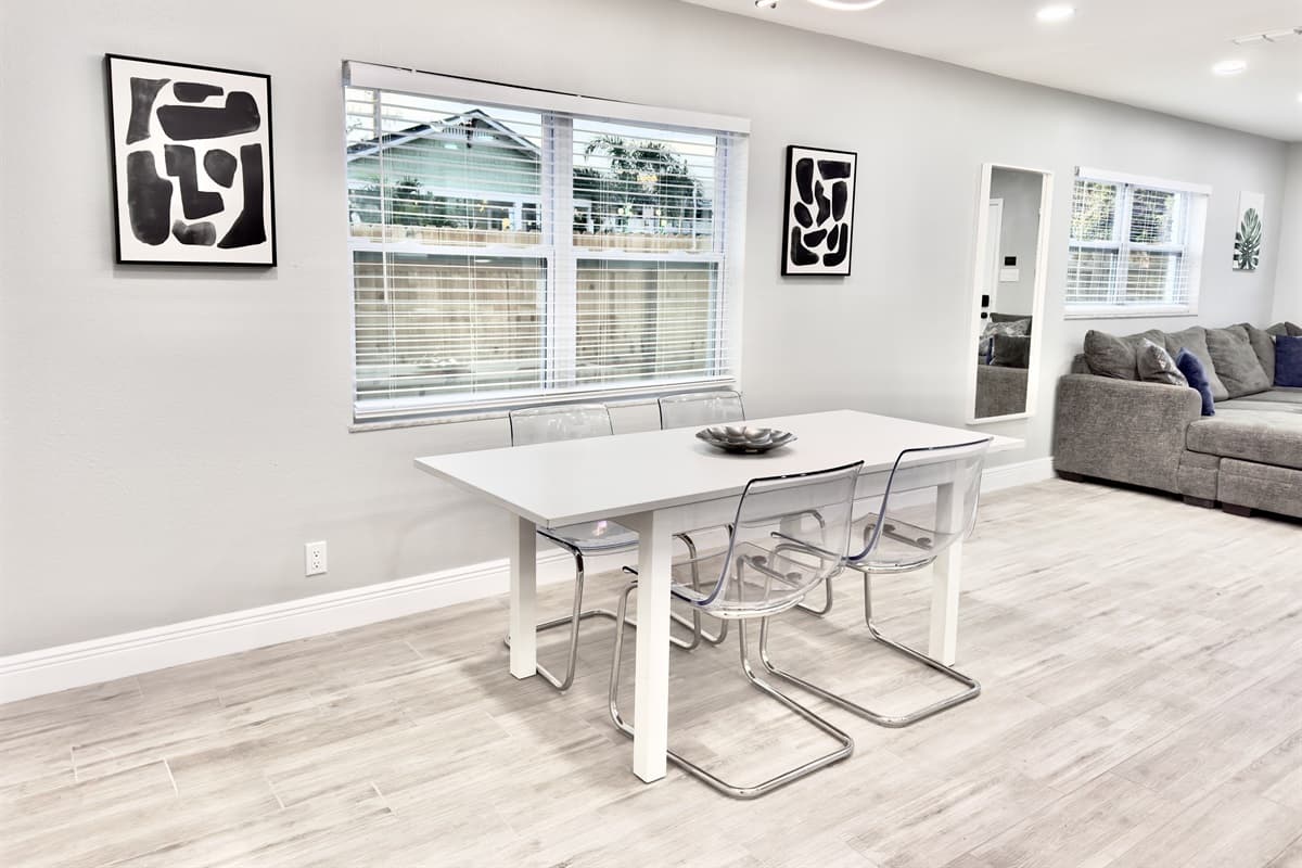For added convenience, the open floor plan allows for seamless interaction between the kitchen, dining, and living areas.