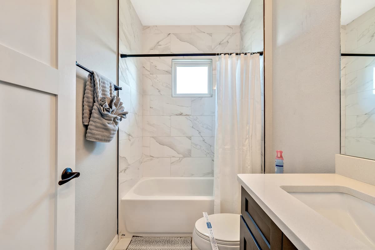 The design is not just practical but also a visual delight, enhancing the overall ambiance of the bathroom.