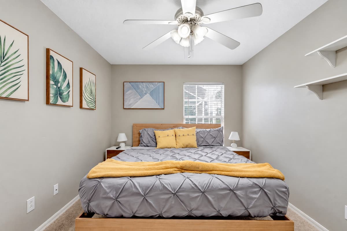 As natural light pours in through the expansive window, the room is bathed in a warm and inviting glow, creating a serene atmosphere. Rest and unwind in style, surrounded by elegance and tranquility in this exquisite queen size bedroom.