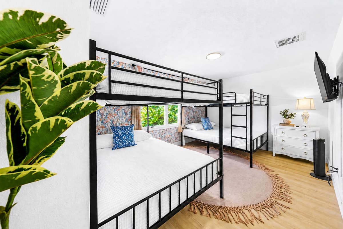 Room for six, drawers for everyone, and a screen on the wall. They'll want to stay in here.