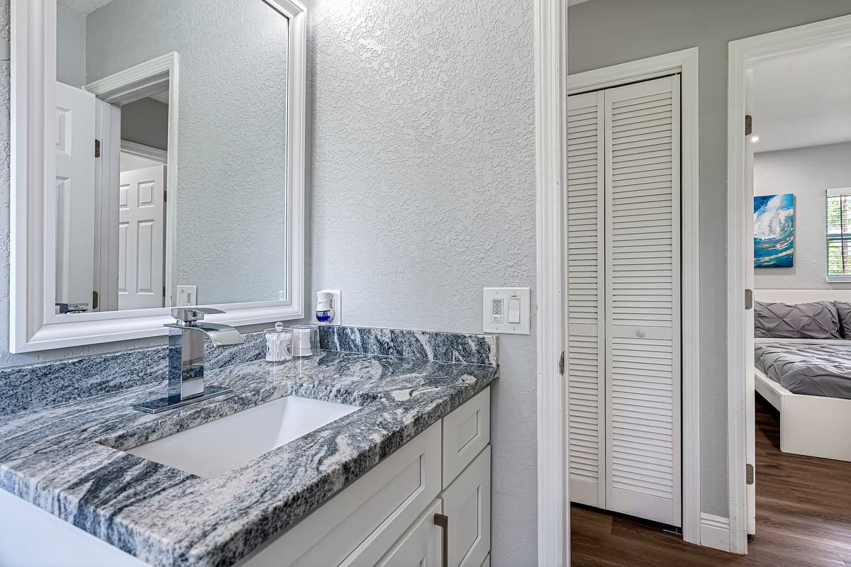 This impeccable bathroom has toilet, sink, bathtub and shower. Feel fresh and clean after a long day of travel from your home to your home away from home. If you are interested in this property, book it now!