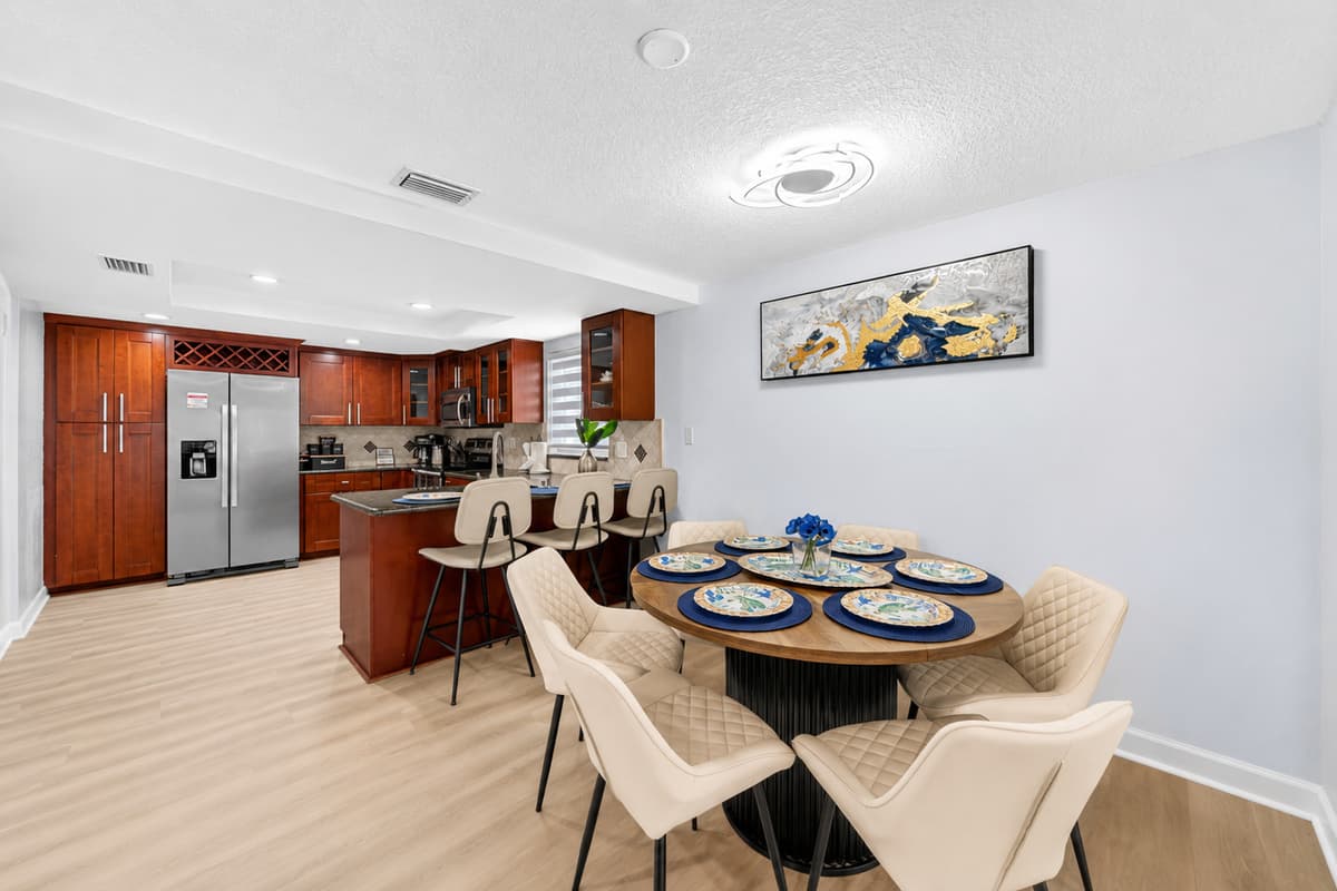 Cozy dining area with seating for six, located just steps from the kitchen and living room for easy entertaining.