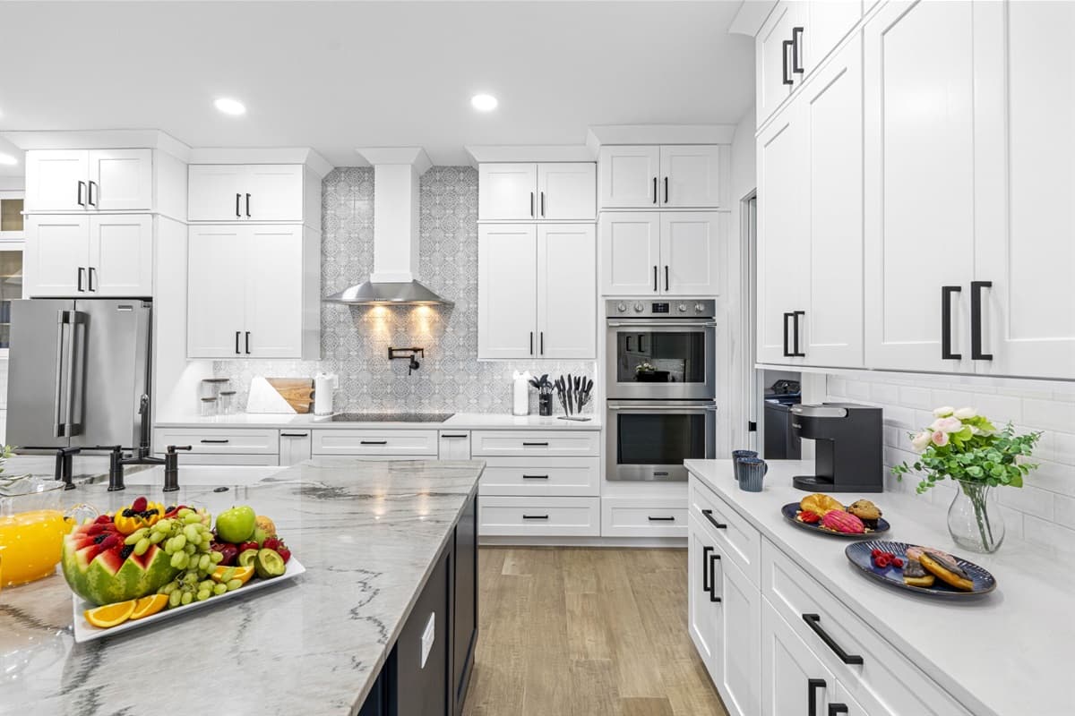 The villa’s open-concept kitchen is fully equipped with top-of-the-line appliances, making it a dream for cooking enthusiasts and casual chefs alike.