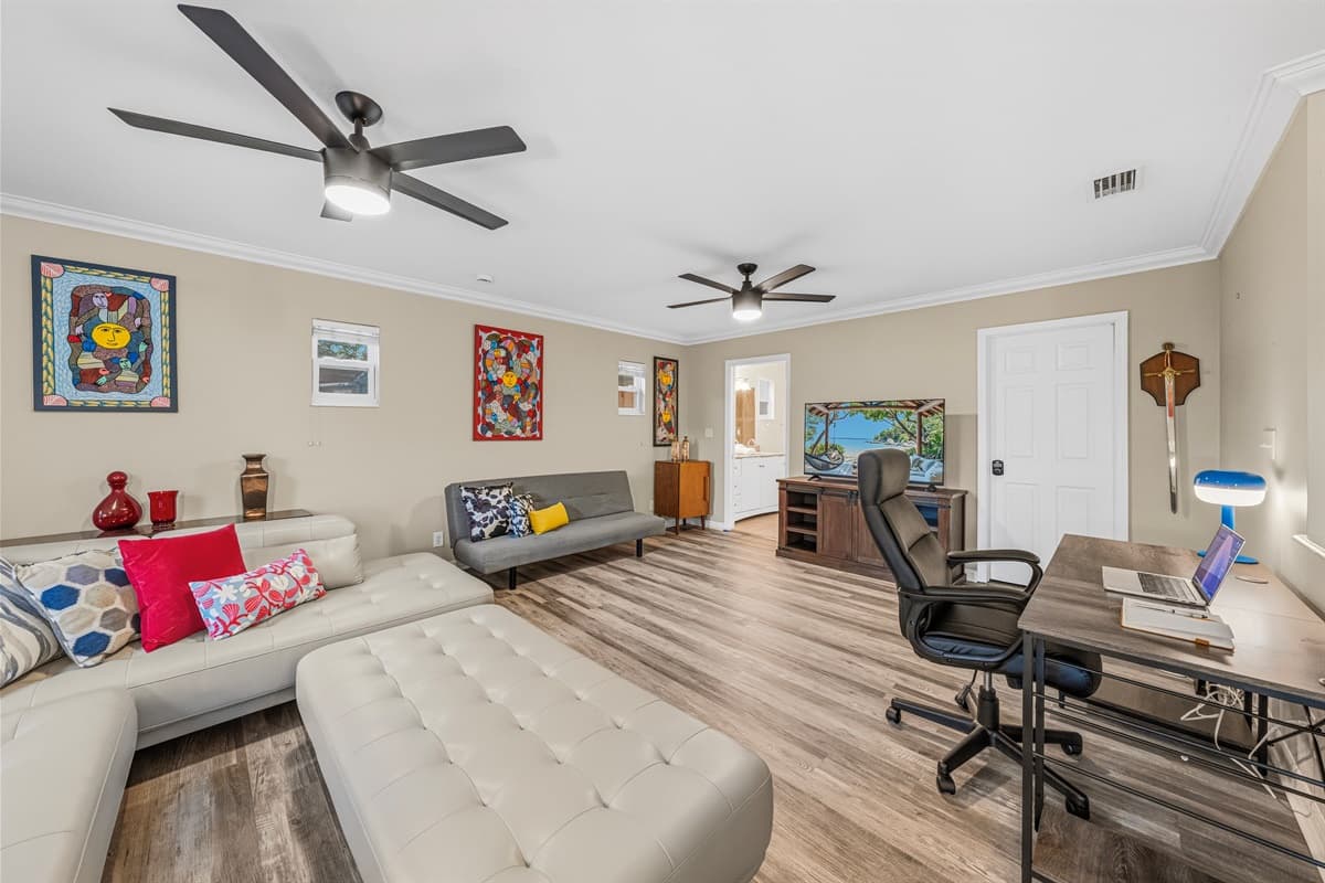 Open living and workspace combo with stylish furnishings and plenty of room to spread out comfortably.