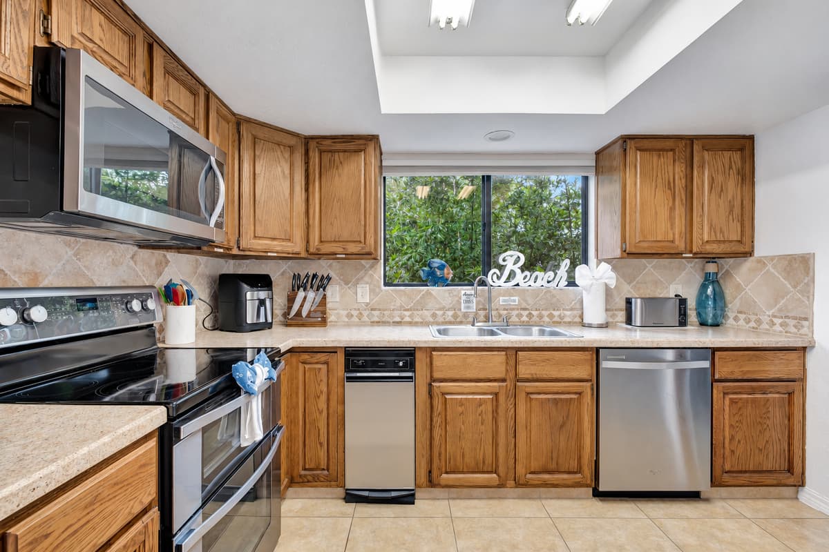 From the precision of the stove to the efficiency of the oven, every appliance has been carefully selected to streamline your cooking process and elevate your dishes to new heights.