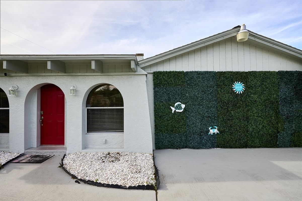 Timeless beauty of our classic home exterior, framed by architectural details that reflect a commitment to style and refinement. 